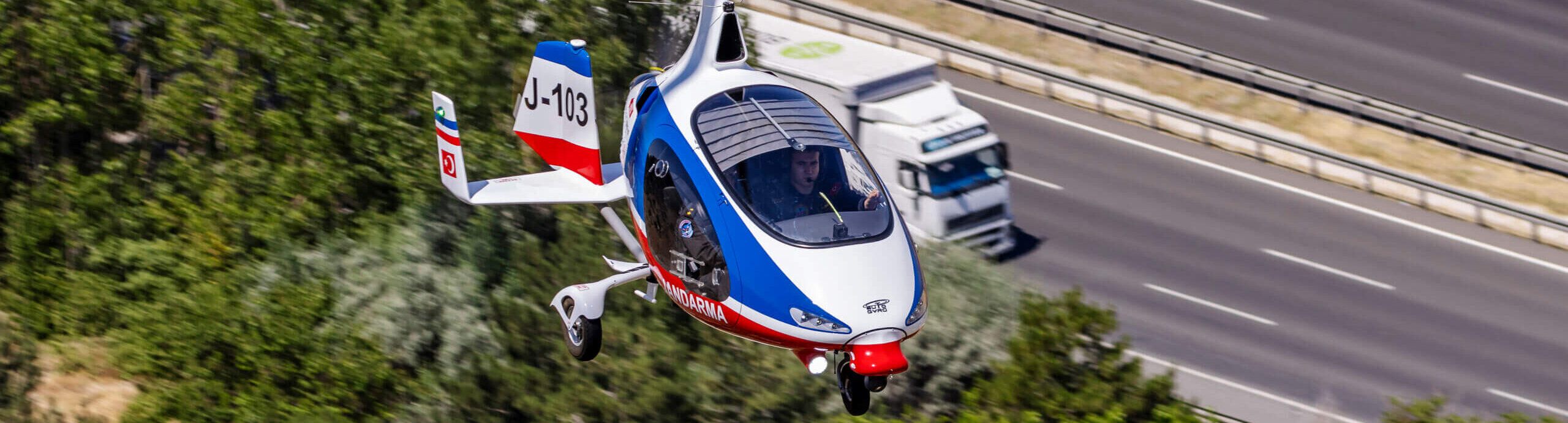 AutoGyro gyroplane Cavalon Sentinel flying over the highway for search and rescue