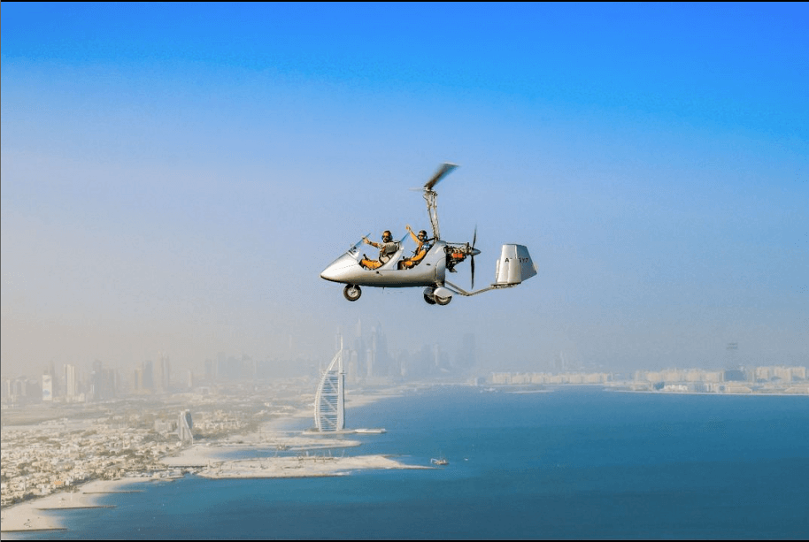 AutoGyro MTOClassic flying tourist flight above Dubai